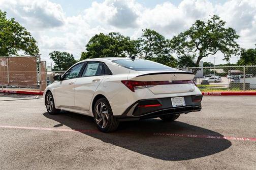 Serenity White 2025 Hyundai ELANTRA HEV SEL Sport