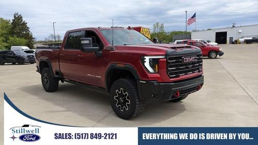 Volcanic Red 2025 GMC Sierra 2500 AT4X