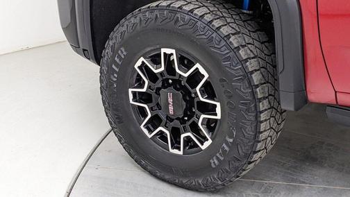 Volcanic Red 2025 GMC Sierra 2500 AT4X