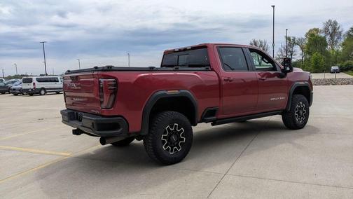 Volcanic Red 2025 GMC Sierra 2500 AT4X