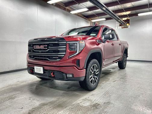 Volcanic Red Tintcoat 2026 GMC Sierra 1500 AT4