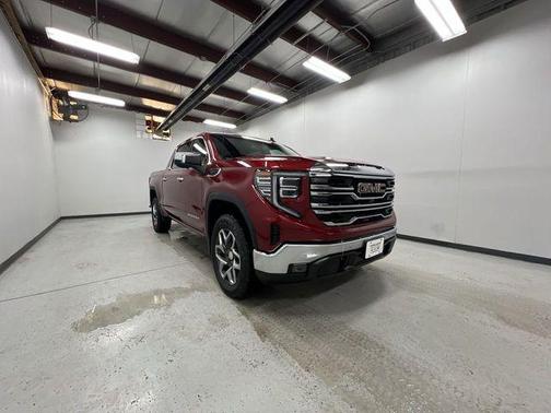 Volcanic Red Tintcoat 2026 GMC Sierra 1500 SLT