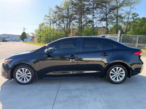 Midnight Black Metallic 2024 Toyota Corolla Hybrid SE