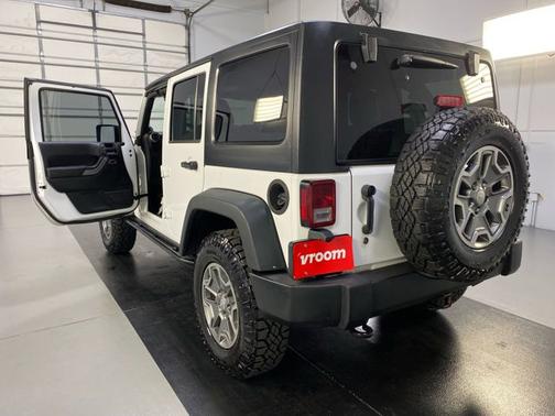 Photo 3 of 17 of 2013 Jeep Wrangler Unlimited Sport