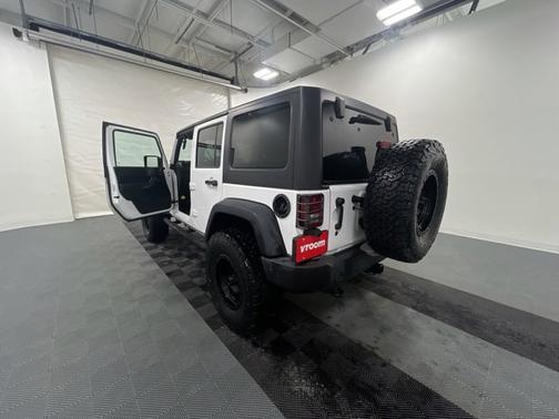 Photo 3 of 17 of 2016 Jeep Wrangler Unlimited Sport