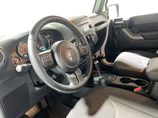 Photo 2 of 16 of 2016 Jeep Wrangler Sport