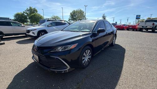 Midnight Black Metallic 2023 Toyota Camry Hybrid LE