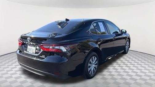 Midnight Black Metallic 2023 Toyota Camry Hybrid LE