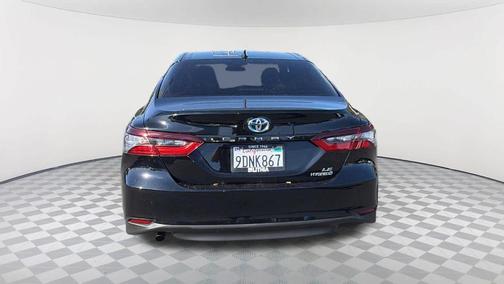 Midnight Black Metallic 2023 Toyota Camry Hybrid LE