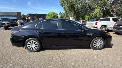 Midnight Black Metallic 2023 Toyota Camry Hybrid LE