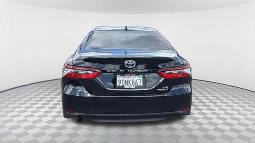 Midnight Black Metallic 2023 Toyota Camry Hybrid LE