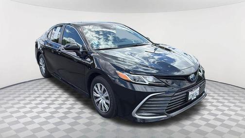 Midnight Black Metallic 2023 Toyota Camry Hybrid LE