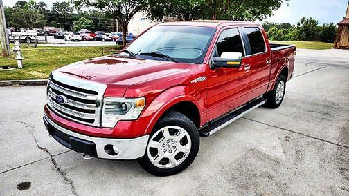 Red 2013 Ford F-150 Lariat