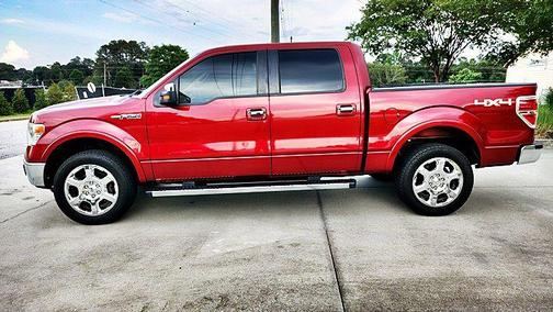 Red 2013 Ford F-150 Lariat
