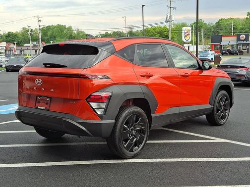 Orange Pearl 2026 Hyundai KONA SEL Sport