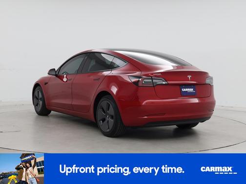 Red 2023 Tesla Model 3