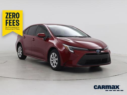 Red 2025 Toyota Corolla Hybrid LE