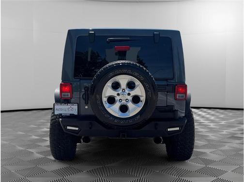 Gray 2014 Jeep Wrangler Unlimited Sahara