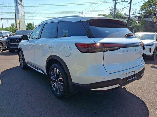 Radiant White 2026 INFINITI QX60 LUXE AWD