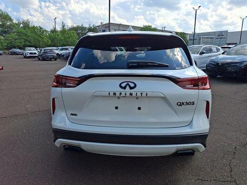 Radiant White 2025 INFINITI QX50 Sport AWD