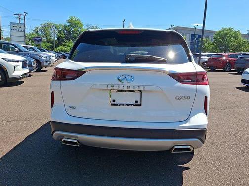 Lunar White 2023 INFINITI QX50 LUXE AWD