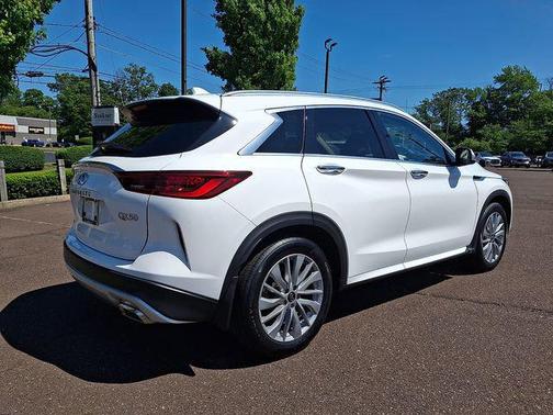 Lunar White 2023 INFINITI QX50 LUXE AWD