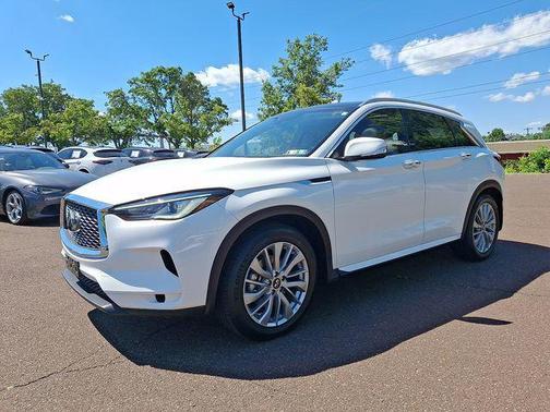 Lunar White 2023 INFINITI QX50 LUXE AWD