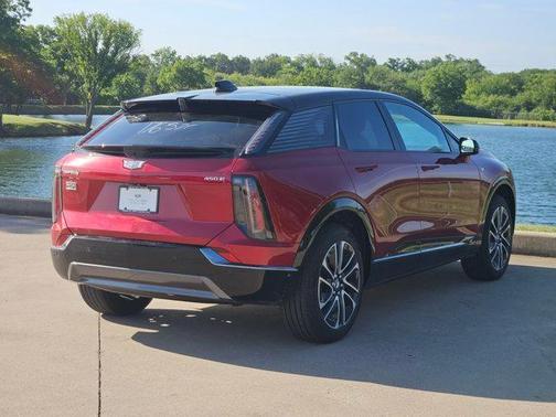 Radiant Red Tintcoat 2026 Cadillac OPTIQ Sport