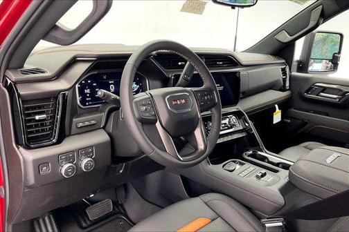 Volcanic Red Tintcoat 2026 GMC Sierra 2500 AT4