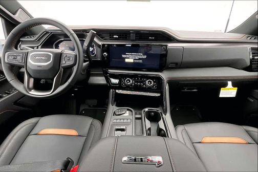 Volcanic Red Tintcoat 2026 GMC Sierra 2500 AT4