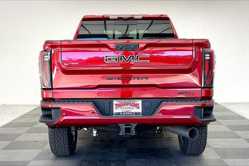 Volcanic Red Tintcoat 2026 GMC Sierra 2500 AT4