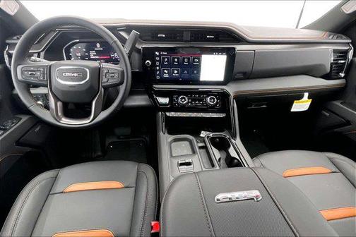 Volcanic Red Tintcoat 2026 GMC Sierra 3500 AT4