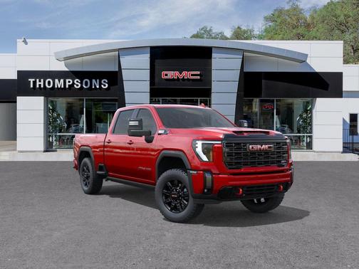 Volcanic Red Tintcoat 2026 GMC Sierra 3500 AT4