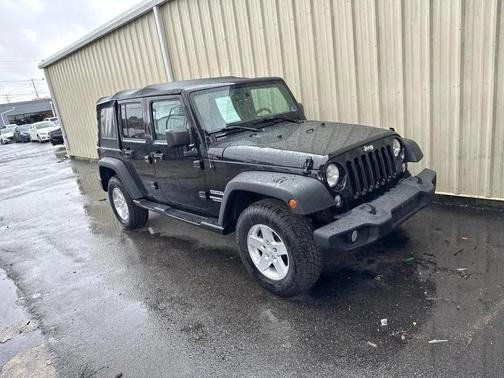 Black 2014 Jeep Wrangler Unlimited Sport