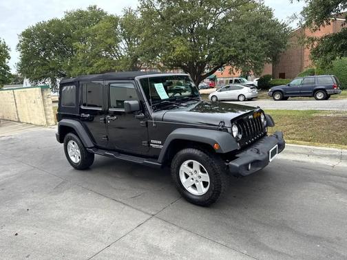 Black 2014 Jeep Wrangler Unlimited Sport