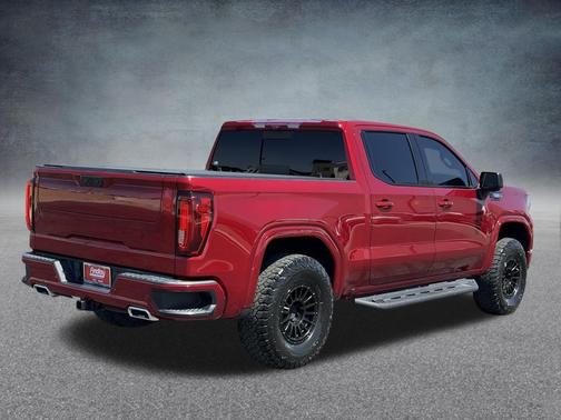 Volcanic Red Tintcoat 2024 GMC Sierra 1500 AT4