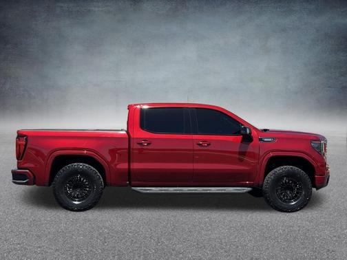 Volcanic Red Tintcoat 2024 GMC Sierra 1500 AT4