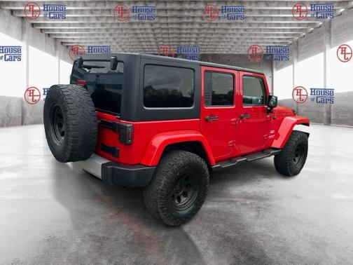 Red 2012 Jeep Wrangler Unlimited Sahara