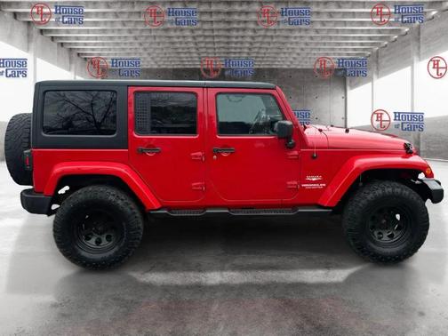 Red 2012 Jeep Wrangler Unlimited Sahara
