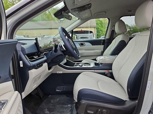 Ivory Silver 2026 Kia Carnival Hybrid EX