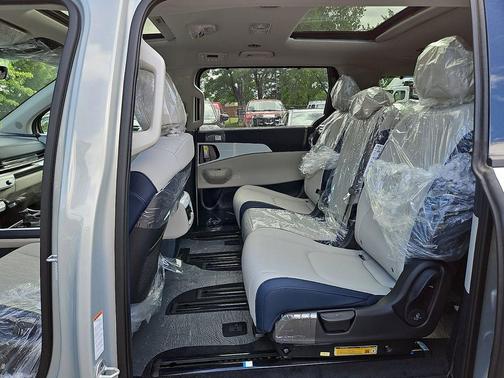 Ivory Silver 2026 Kia Carnival SX
