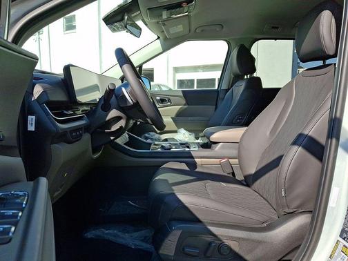 Ivory Silver 2026 Kia Carnival Hybrid EX
