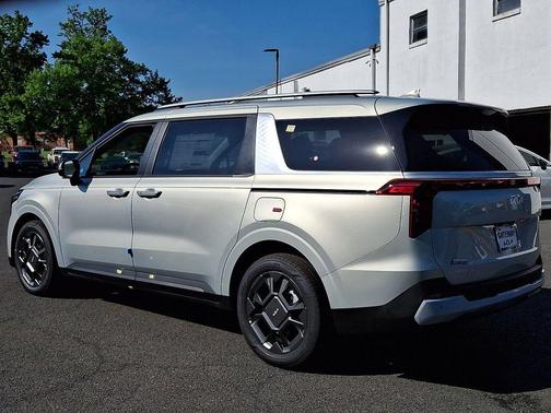 Ivory Silver 2026 Kia Carnival Hybrid EX