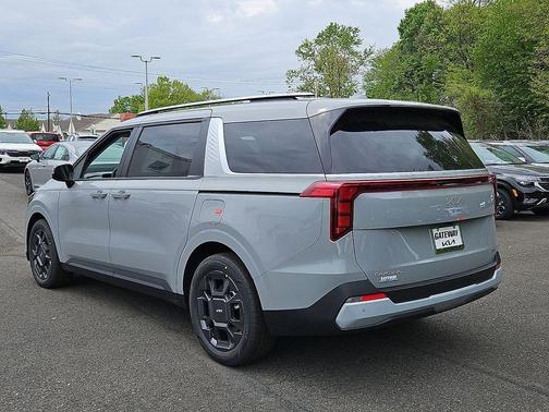 Ceramic Silver 2026 Kia Carnival Hybrid EX