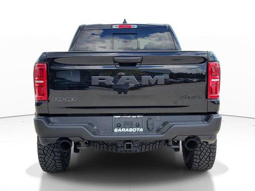 Diamond Black Crystal Pearlcoat 2026 RAM 1500 RHO Crew Cab 4x4 5'7' Box