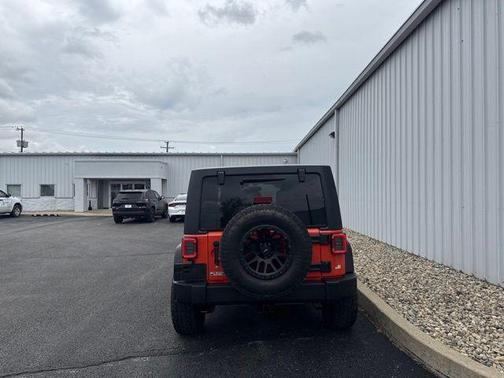 Sunset Orange Pearlcoat 2015 Jeep Wrangler Unlimited Rubicon