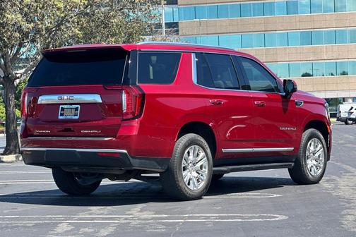 Volcanic Red Tintcoat 2024 GMC Yukon Denali