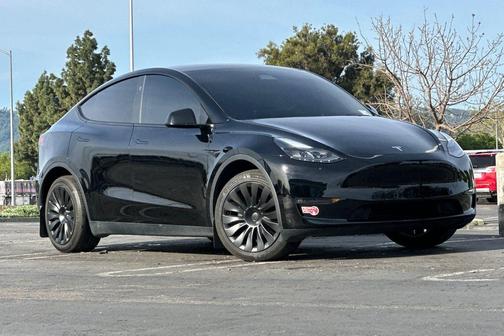 Solid Black 2024 Tesla Model Y Long Range Dual Motor All-Wheel Drive