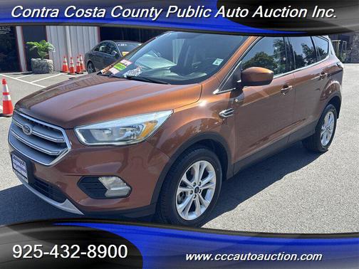 Orange 2017 Ford Escape SE