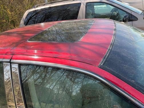 Crystal Red Tintcoat 2010 Cadillac DTS Luxury Collection